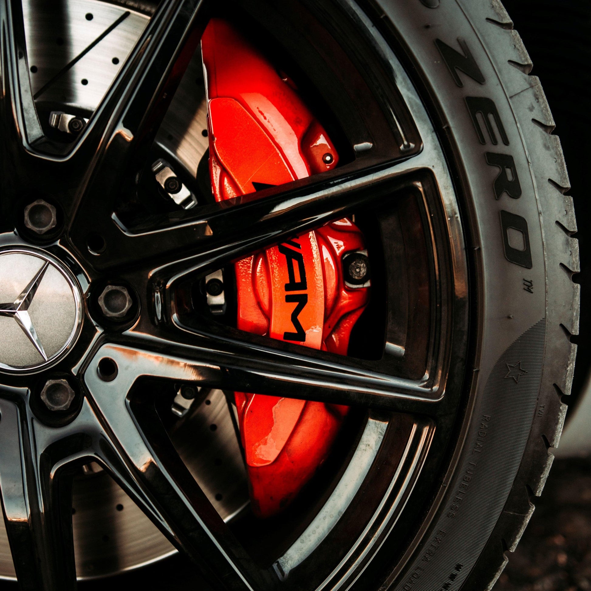 mercedes benz black rims amg red brembo brake calipers p zero tires